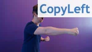 Man Punching in the Air while in VR Goggles